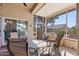 Outdoor sunroom with seating area and view of the backyard at 14137 W Via Manana --, Sun City West, AZ 85375