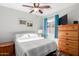 Cozy bedroom with a double bed and dresser at 14749 N 153Rd Dr, Surprise, AZ 85379