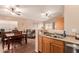 Dining area with table and chairs, open to living room at 14749 N 153Rd Dr, Surprise, AZ 85379