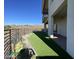 Artificial turf backyard with a view and a covered patio at 14840 E Valley Vista Dr, Fountain Hills, AZ 85268