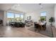 Modern dining room with wood table, seating, and mountain views at 14840 E Valley Vista Dr, Fountain Hills, AZ 85268