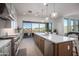 Modern kitchen with island, stainless steel appliances, and mountain views at 14840 E Valley Vista Dr, Fountain Hills, AZ 85268