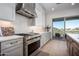 Modern kitchen with stainless steel appliances and mountain views at 14840 E Valley Vista Dr, Fountain Hills, AZ 85268