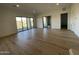 Spacious living area with hardwood floors and access to patio at 14840 E Valley Vista Dr, Fountain Hills, AZ 85268