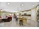 Modern kitchen with granite countertops, an island, and stainless steel appliances at 15813 N 109Th Ln, Sun City, AZ 85351