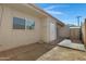 Enclosed backyard featuring a storage shed, window and access to the main part of the house at 17242 N 16Th Dr # 9, Phoenix, AZ 85023