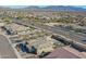 Single-story home with desert mountain backdrop at 18147 W Sandy Rd, Goodyear, AZ 85338