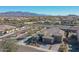 Single-story home with desert mountain backdrop at 18147 W Sandy Rd, Goodyear, AZ 85338