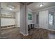 Bright entryway with built-in bench and storage at 18147 W Sandy Rd, Goodyear, AZ 85338