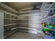 Well-organized garage storage with shelving at 18147 W Sandy Rd, Goodyear, AZ 85338