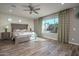 Large main bedroom with plush carpet and large window at 18147 W Sandy Rd, Goodyear, AZ 85338