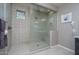 Large walk-in shower with patterned tile and glass enclosure at 18147 W Sandy Rd, Goodyear, AZ 85338