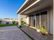 Spacious backyard patio with pavers and sliding glass doors at 18280 N Piccolo Dr, Maricopa, AZ 85138