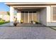 Covered patio with paver stones and potted plants at 18280 N Piccolo Dr, Maricopa, AZ 85138