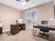 Home office with two desks and ample workspace at 18280 N Piccolo Dr, Maricopa, AZ 85138