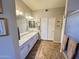 Elegant bathroom with double sinks, granite counters, and a separate shower at 1878 E Oasis Dr, Tempe, AZ 85283