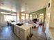 Modern kitchen island with granite countertop and a breakfast bar at 1878 E Oasis Dr, Tempe, AZ 85283