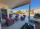 Inviting covered patio with pool views and comfortable seating at 1878 E Oasis Dr, Tempe, AZ 85283