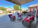 Relaxing covered patio with comfortable seating overlooking the pool at 1878 E Oasis Dr, Tempe, AZ 85283