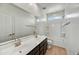 Modern bathroom with double vanity and large tub at 19339 W Valle Vista Way, Litchfield Park, AZ 85340