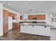 Modern kitchen featuring granite countertops and ample wood cabinetry at 19436 W Valle Vista Way, Litchfield Park, AZ 85340