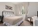 Cozy bedroom with a comfy bed and neutral color scheme at 19651 W Monterey Way, Buckeye, AZ 85396