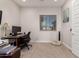 Home office with a desk, chair, and ample natural light at 19651 W Monterey Way, Buckeye, AZ 85396