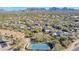 Aerial view of community with tennis courts and mountain views at 20802 N Grayhawk Dr # 1173, Scottsdale, AZ 85255