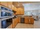 Modern kitchen with stainless steel appliances and ample cabinetry at 20802 N Grayhawk Dr # 1173, Scottsdale, AZ 85255