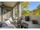 Cozy patio with seating area and grill at 20802 N Grayhawk Dr # 1173, Scottsdale, AZ 85255