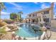 Inviting pool with waterfall feature and spacious backyard at 2340 W Myrtle Dr, Chandler, AZ 85248