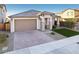 Single-story home with a two-car garage and landscaped front yard at 25536 S 230Th St, Queen Creek, AZ 85142