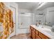 Bathroom with double vanity and large walk-in shower at 25875 W St Catherine Ave, Buckeye, AZ 85326