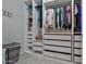 Spacious walk-in closet with shelves and drawers at 25940 W Oraibi Dr, Buckeye, AZ 85396