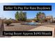 Landscaped backyard features a covered patio, a refreshing pool, and gravel ground covering at 2605 S 80Th Ave, Phoenix, AZ 85043