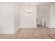 Simple dining area with tile floors and entryway view at 2605 S 80Th Ave, Phoenix, AZ 85043