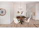 Small dining area with wood table and four beige chairs at 2605 S 80Th Ave, Phoenix, AZ 85043