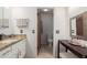 Main bathroom with granite vanity and toilet at 2618 W Surrey Ave, Phoenix, AZ 85029