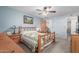 Cozy bedroom with a wooden bed frame and two nightstands at 2618 W Surrey Ave, Phoenix, AZ 85029