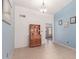 Small dining area with tiled floors and a hutch at 2618 W Surrey Ave, Phoenix, AZ 85029