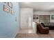 Bright entryway with light walls and tiled floor at 2618 W Surrey Ave, Phoenix, AZ 85029