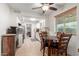 Kitchen with granite countertops and a dining area at 2618 W Surrey Ave, Phoenix, AZ 85029