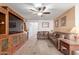 Living room showcasing a large TV stand and comfortable seating at 2618 W Surrey Ave, Phoenix, AZ 85029