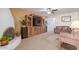 Living room with a cozy fireplace and built-in entertainment center at 2618 W Surrey Ave, Phoenix, AZ 85029