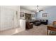 Living room with comfy seating and a ceiling fan at 2618 W Surrey Ave, Phoenix, AZ 85029