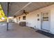 Covered patio with ceiling fans, offering shade and outdoor relaxation at 2618 W Surrey Ave, Phoenix, AZ 85029