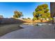 Kidney-shaped pool surrounded by a large backyard at 2618 W Surrey Ave, Phoenix, AZ 85029