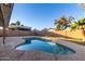 Relaxing kidney-shaped pool perfect for summer enjoyment at 2618 W Surrey Ave, Phoenix, AZ 85029