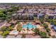 Aerial view of community pool, playground, and homes at 2757 S Pewter Dr # 103, Gilbert, AZ 85295