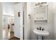 Small bathroom with pedestal sink and white vanity at 2757 S Pewter Dr # 103, Gilbert, AZ 85295